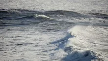 Slowmotion ocean waves breaking