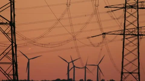 Sunset Wind Turbine And Power Lines