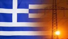 Energy Concept Greece Flag with sunset power pole