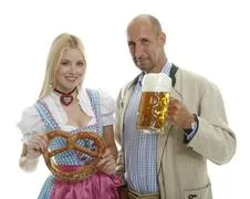 Woman In Dirndl And Man In Leather Trousers 