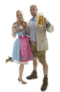 Woman In Dirndl And Man In Leather Trousers 
