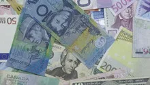 Time lapse pan and tilt shot of money piling up