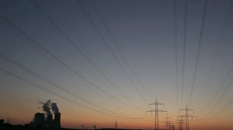 Power Plant With Power Lines During Sunset