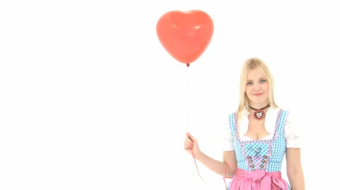 Woman In Dirndl With Red Balloon
