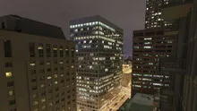 4K Time lapse tilt shot aerial traffic intersection at night