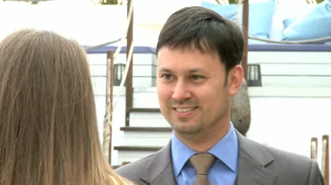 Greeting With A Businessman Smiling