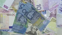 4K Time lapse zoom out of money piling up