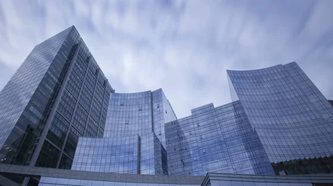 4K Time Lapse Glass Skyscrapers Zoom Out