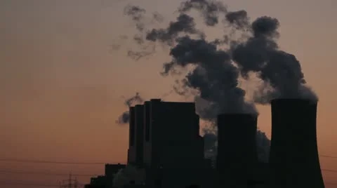 Power Plant With Power Lines During Sunset
