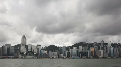 4K Time Lapse Hong Kong Skyline Dark Clouds