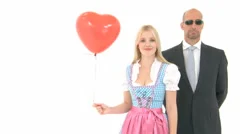 Woman In Dirndl With Bodyguard
