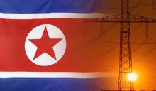 Energy Concept North Korea Flag with sunset power pole