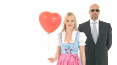 Woman In Dirndl Making Fun About Bodyguard
