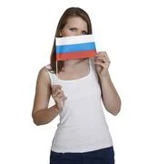Woman Hides Her Face Behind Flag Of Russia