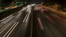 4K Time lapse zoom out freeway light trails at night