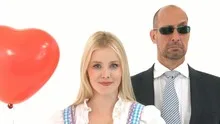 Woman in Dirndl with Bodyguard