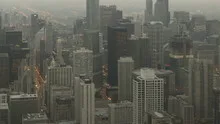 Time lapse tilt and pan shot Chicago skyline sunset