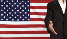 Open hand and USA flag in the background