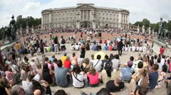 Tourists In Front Of Buckingham Palace