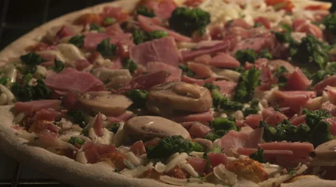 4K Time Lapse Pan Shot Pizza With Ham And Mushrooms