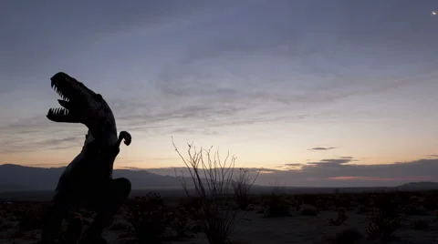 4K Time Lapse Close Up Desert Sunrise Dinosaur Silhouette