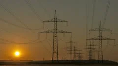 Sunset Wind Turbine And Power Lines