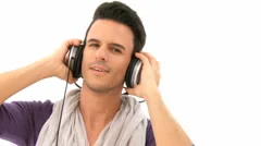Pan Shot Of Man Listening To Music