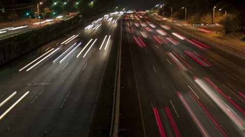 4K Time Lapse Zoom Out Freeway Light Trails At Night