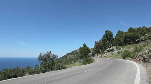 Coast Highway, Asphalt Road Along A Sea Coastline On Mallorca, Spain