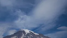 4K Time lapse zoom out Mt. Rainier with clouds