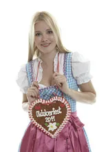 Woman with German Lebkuchen heart