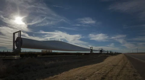 4K Time Lapse Windmill Blades On Cargo Train With Highway