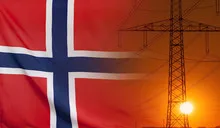 Energy Concept Norway Flag with sunset power pole