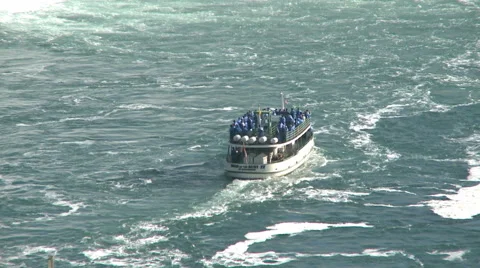 The Boat Maid Of Mist In The Middle Of The Niagara Falls