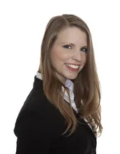 Portrait of a smiling young businesswoman on white background