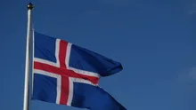 Slowmotion lowering Icelandic flag