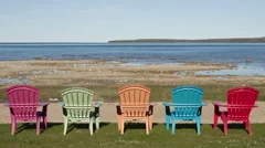 4K Time Lapse Shadow Over Colored Chairs At Lake