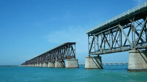 Boat Under Broken Railroad Bridge
