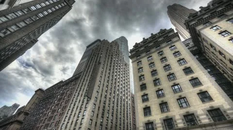 Hdr Timelapse Dark Clouds Above Skyscraper