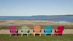 4K Time Lapse Shadow Over Colored Chairs At Lake