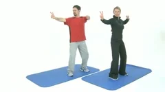 Two People Practicing Tai Chi