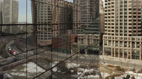 4K Time Lapse Zoom Out Of Traffic On Office Building Reflection