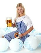 Bavarian Girl Cheers With A Beer
