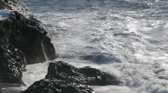 Slowmotion Waves Crashing On Rock Coast