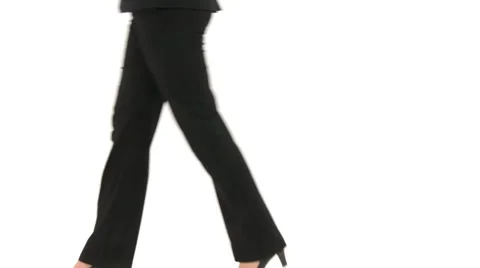 Businesswoman walking by close up legs
