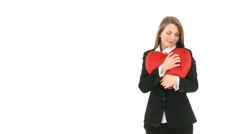 Woman Cuddling With Red Heart Pillow