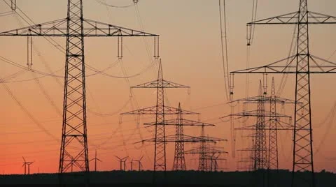 Sunset Wind Turbine And Power Lines