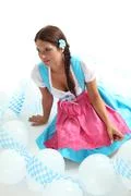 Bavarian Waitress Sitting Between Balloons