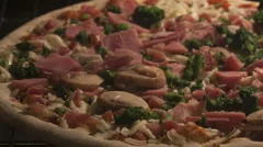 Time Lapse Pan Shot Pizza With Ham And Mushrooms