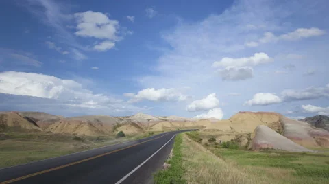 4K Time Lapse Zoom Out Badlands Colorful Yellow Mounds